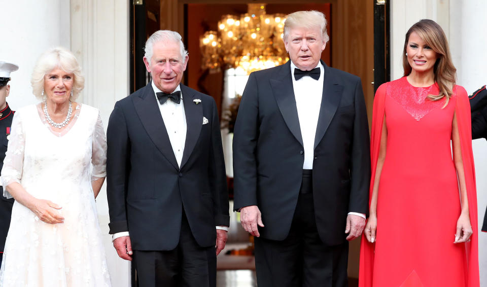 The Prince of Wales and the Duchess of Cornwall are greeted by US President Donald Trump and his wife Melania outside Winfield House, the residence of the Ambassador of the United States of America to the UK, in Regent's Park, London, for the Return Dinner as part of his state visit to the UK.