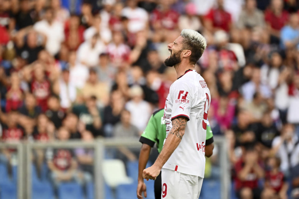 Milan's Olivier Giroud reacts during the Serie A soccer match between Sassuolo and Milan at Mapei Stadium, Reggio Emilia, Italy, Tuesday Aug. 30, 2022. (Massimo Paolone/LaPresse via AP)