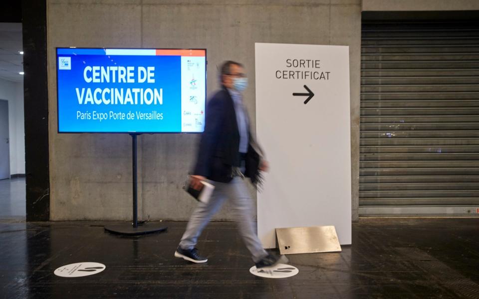 A man leaves the latest mass-vaccination centre, at the National Exhibition Centre, having received his vaccine -  Kiran Ridley / Getty