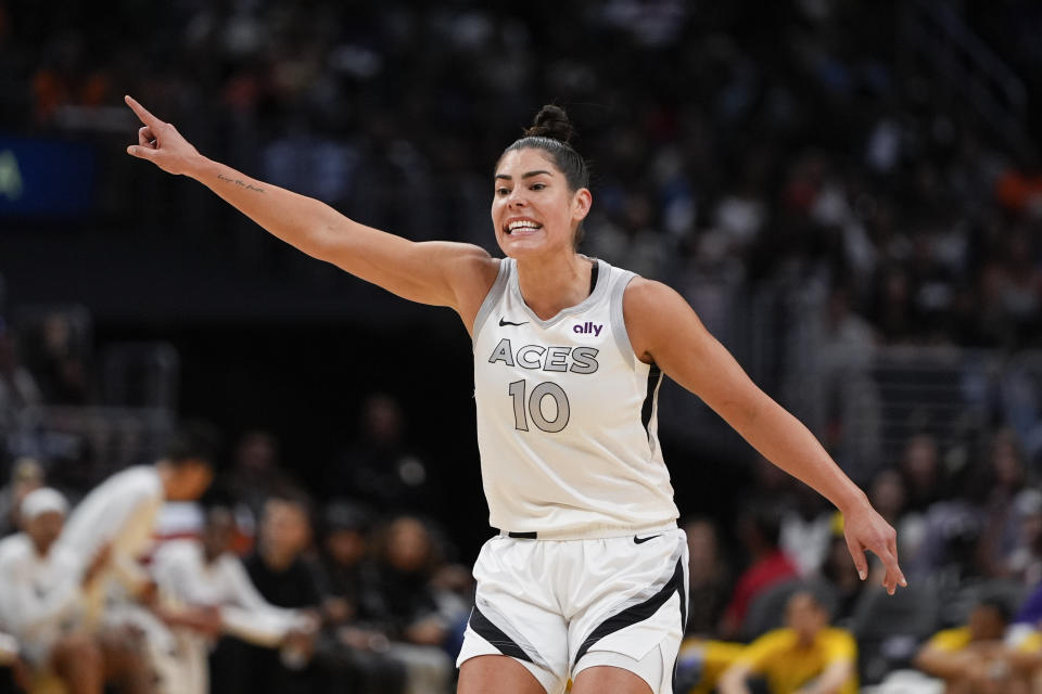 Las Vegas Aces guard Kelsey Plum gestures during the first half of a WNBA basketball game against the Los Angeles Sparks, Sunday, June 9, 2024, in Los Angeles. (AP Photo/Ryan Sun)