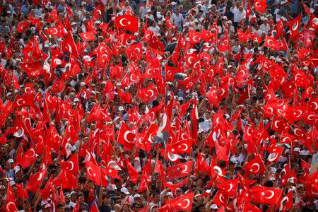 Supporters of Muharrem Ince, presidential candidate of the main opposition Republican People's Party (CHP), wave flags during an election rally in Izmir, Turkey. REUTERS/Osman Orsal