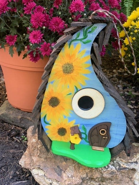 Carri and Danny Rogers share the work of crafting their Curvy Birdies birdhouses.