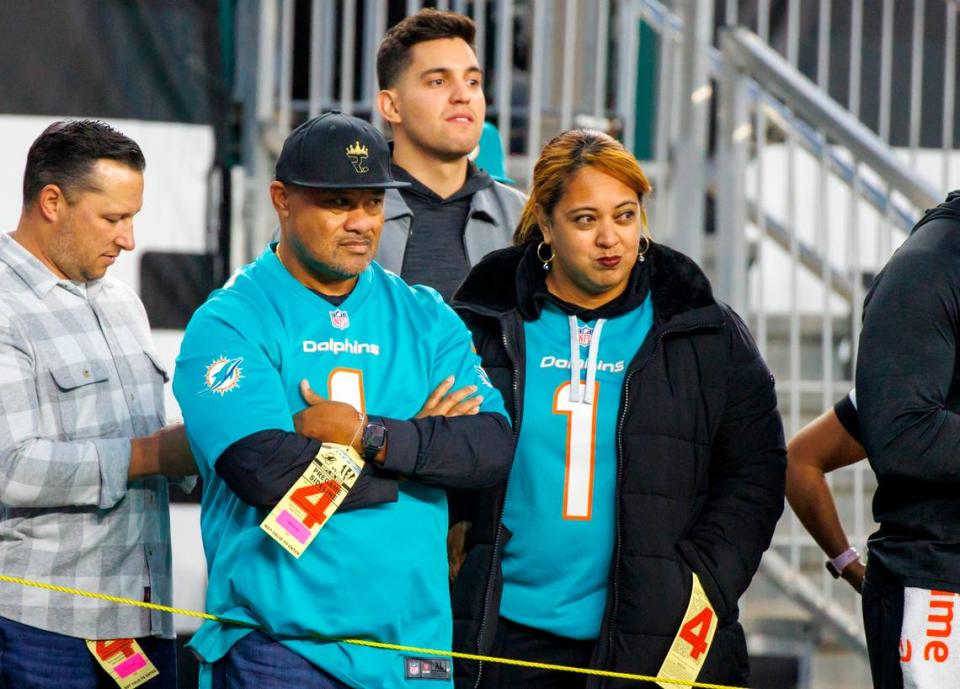 Miami Dolphins quarterback Tua Tagovailoa parents Galu and Diane look from the sidelines during pregame warmups before the start of an NFL football game at Paycor Stadium on Thursday, September 29, 2022 in Cincinnati, Ohio.