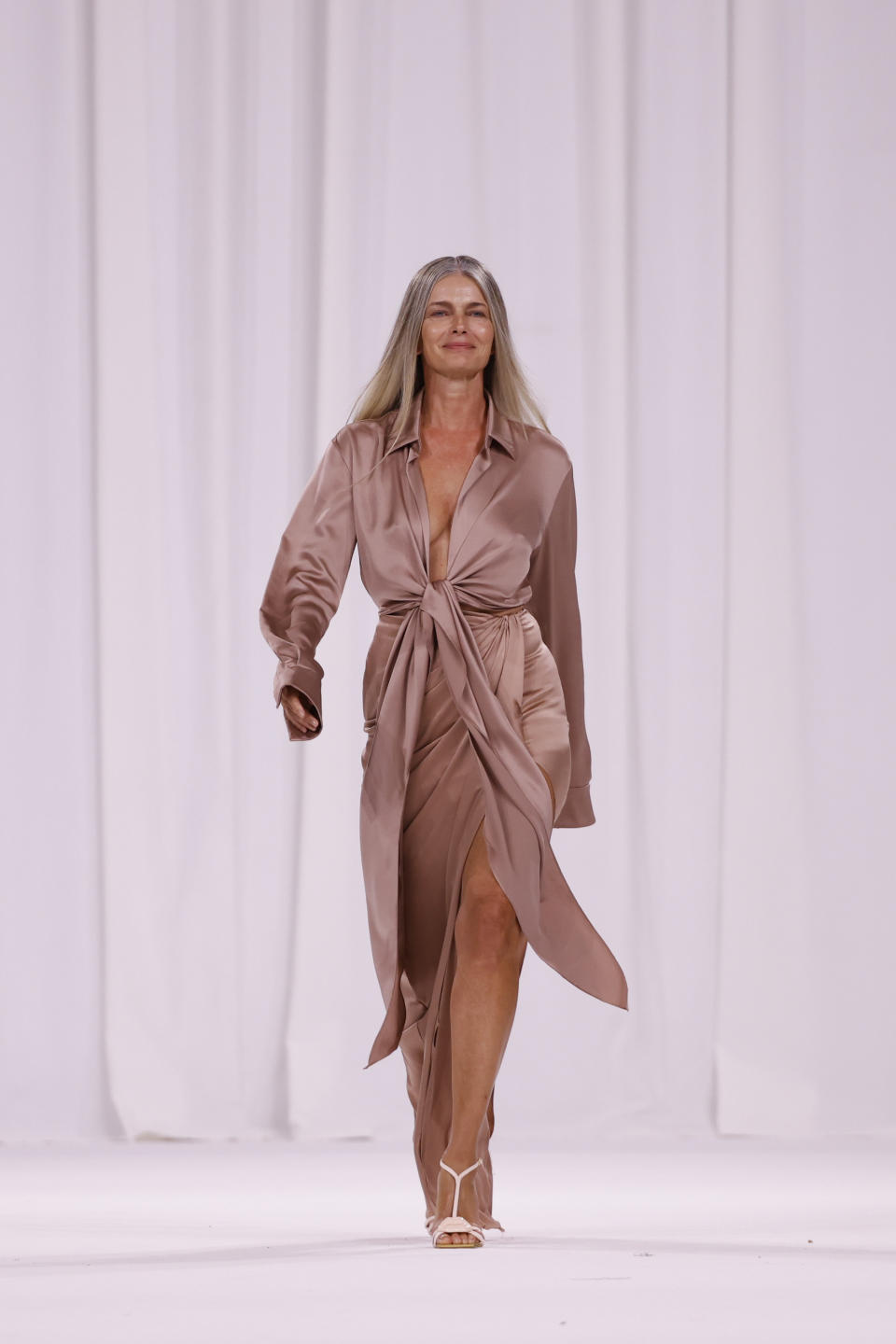 Paulina Porizkova wears a creation as part of the Balmain Spring/Summer 2025 collection presented Wednesday, Sept. 25, 2024, in Paris. (Photo by Vianney Le Caer/Invision/AP)