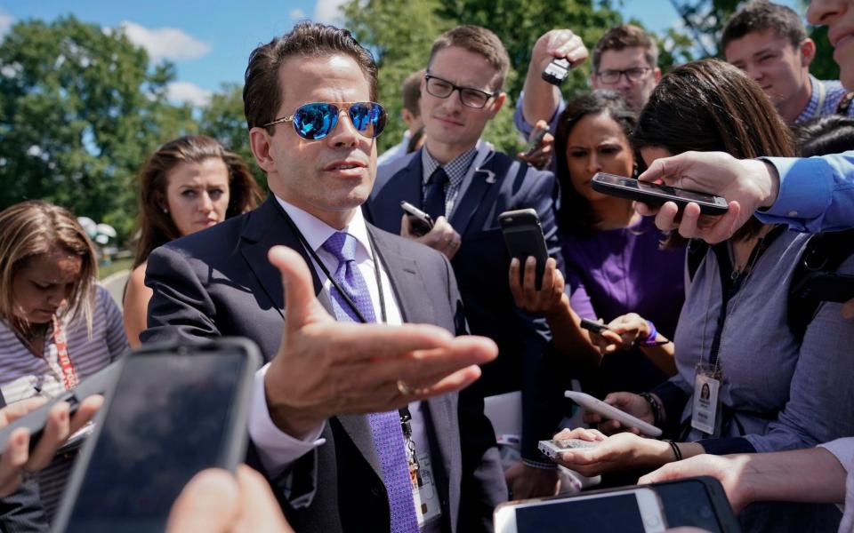 Anthony Scaramucci talking to reporters at the White House - Credit: AP