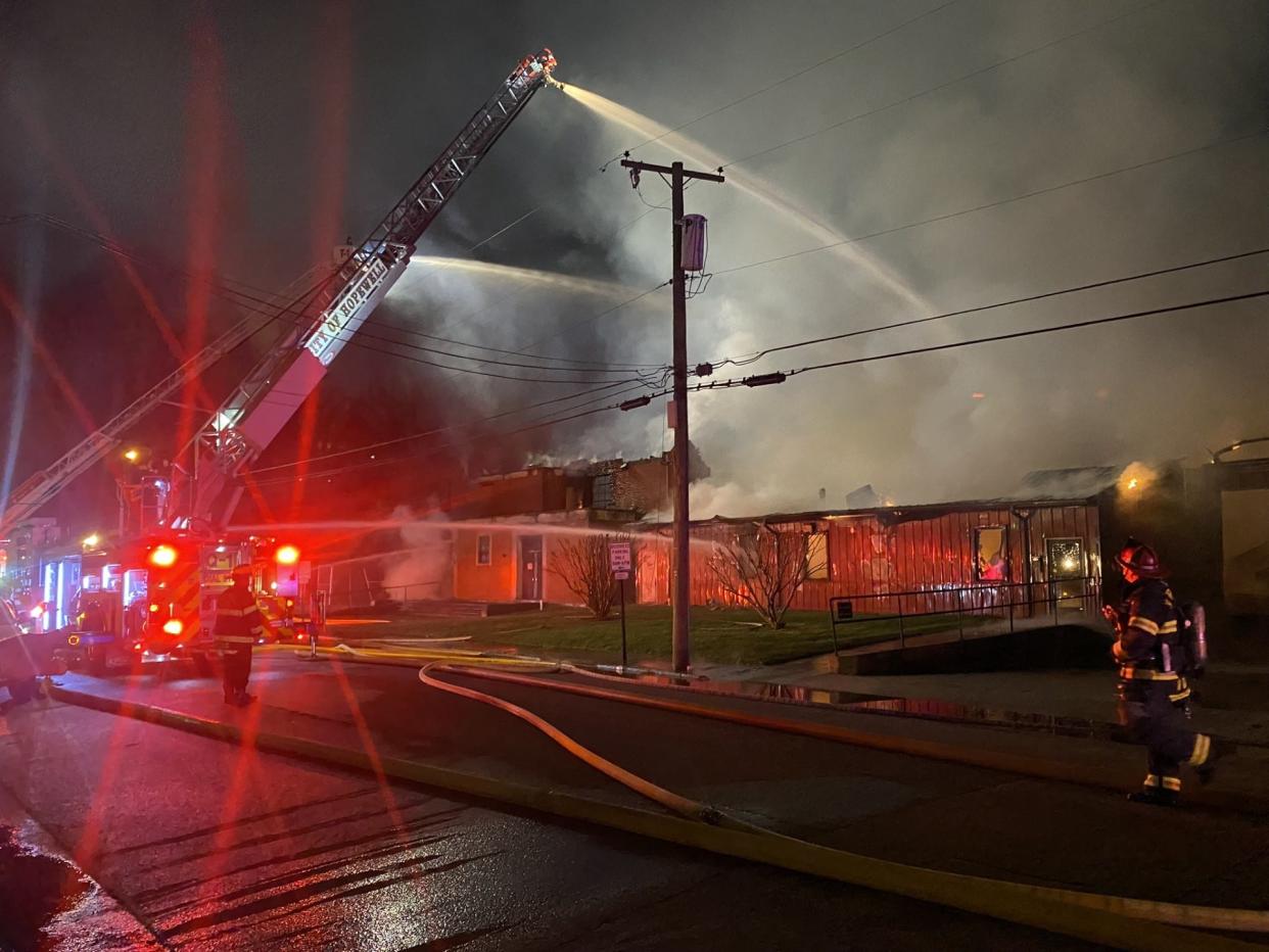 This photo, taken March 19, 2023, shows the former Winndom Mattress building in Hopewell being destroyed by a fire. Six weeks after the fire, the family-owned Winndom restarted shipping custom-made mattresses to its vendors from a new location on Randolph Road.