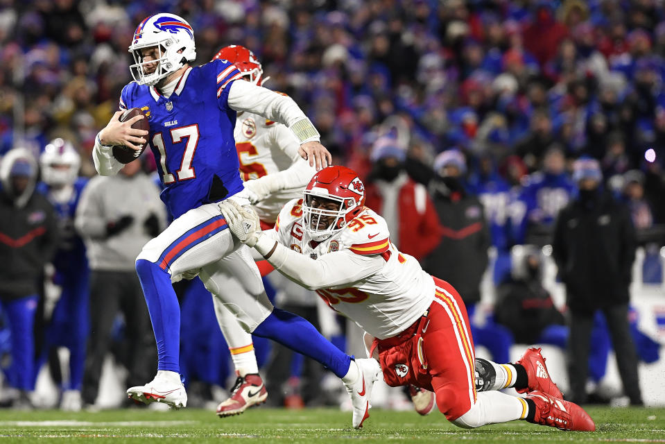 Kansas City Chiefs defensive tackle Chris Jones (95) tackles Buffalo Bills quarterback Josh Allen (17) during the second quarter of an NFL AFC division playoff football game, Sunday, Jan. 21, 2024, in Orchard Park, N.Y. (AP Photo/Adrian Kraus)