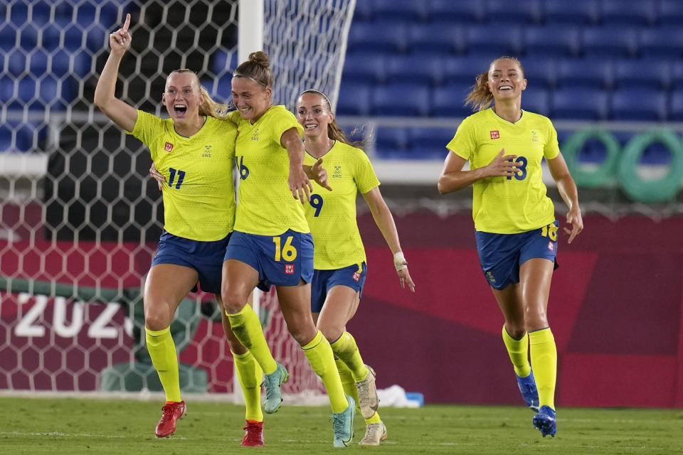 Sweden's Stina Blackstenius celebrates scoring the opening goal against Canada in the women's soccer match for the gold medal at the 2020 Summer Olympics, Friday, Aug. 6, 2021, in Yokohama, Japan. (AP Photo/Fernando Vergara)