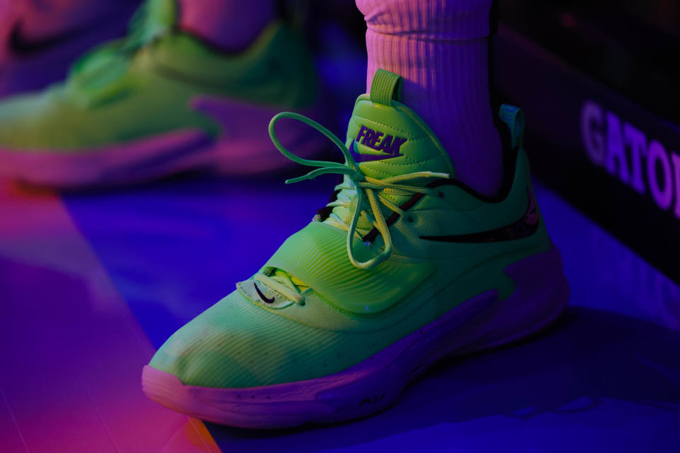 Milwaukee Bucks forward Giannis Antetokounmpo's (34) shoes glow before an NBA basketball game against the Indiana PacersT hursday, March 16, 2023, in Milwaukee. (AP Photo/Jeffrey Phelps)