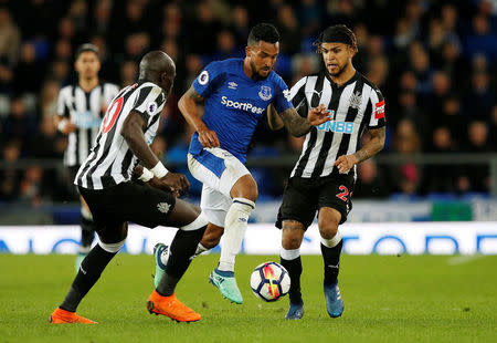 Soccer Football - Premier League - Everton v Newcastle United - Goodison Park, Liverpool, Britain - April 23, 2018 Everton's Theo Walcott in action with Newcastle United's DeAndre Yedlin and Mohamed Diame