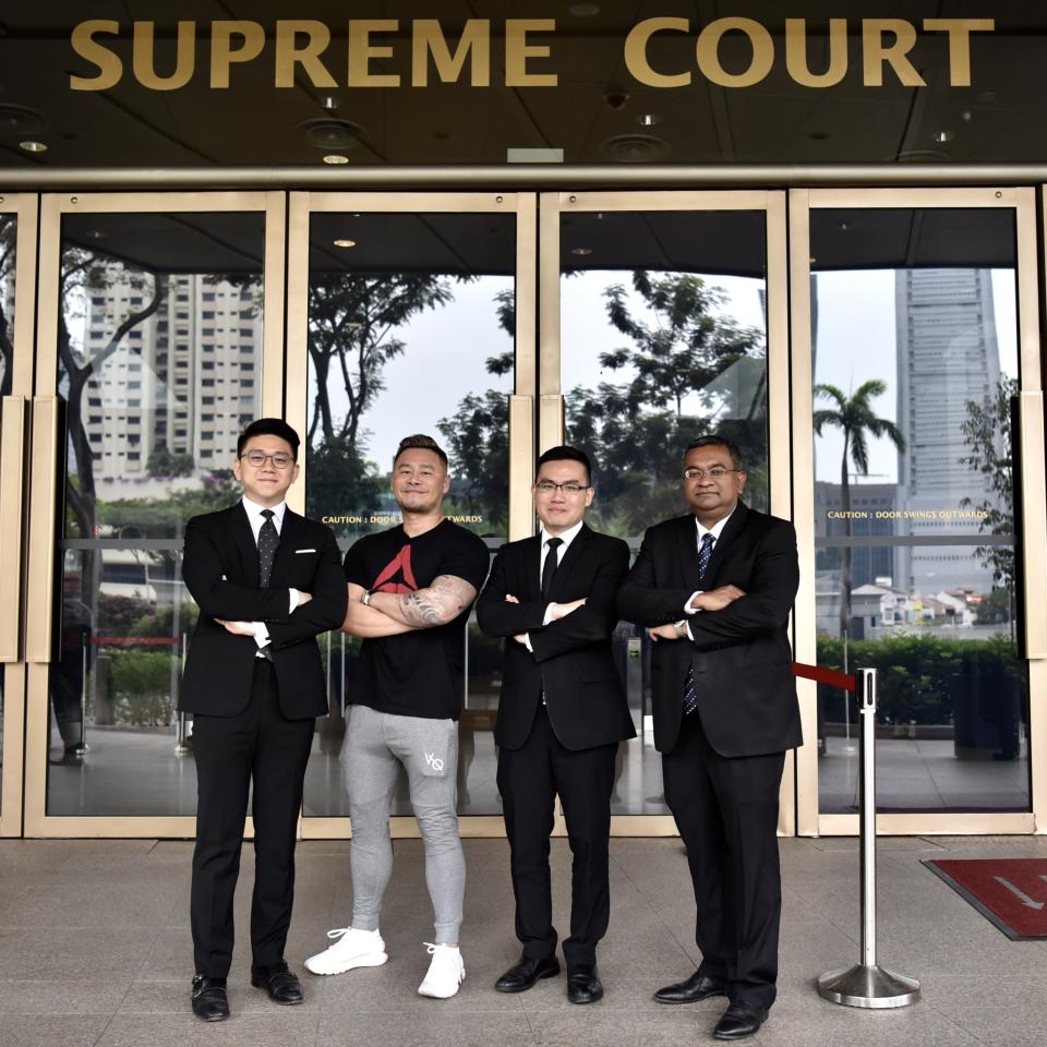 Johnson Ong Ming, a disc jockey and music producer known as DJ Big Kid, with his lawyers.