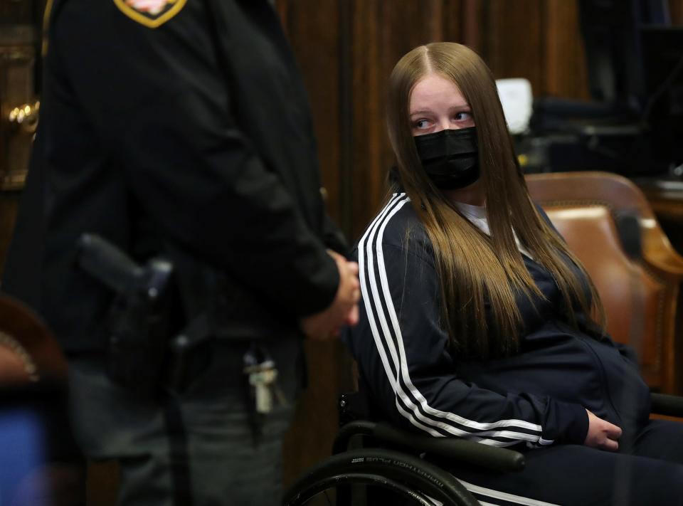 Defendant Jessica Skinner looks back at family members of Lisabeth Dayton of Canton before being sentenced to 6-9 years in prison for the drunk driving death of Dayton in Judge Alison McCarty's courtroom at the Summit County Courthouse, Wednesday, Oct. 11, 2023, in Akron, Ohio.