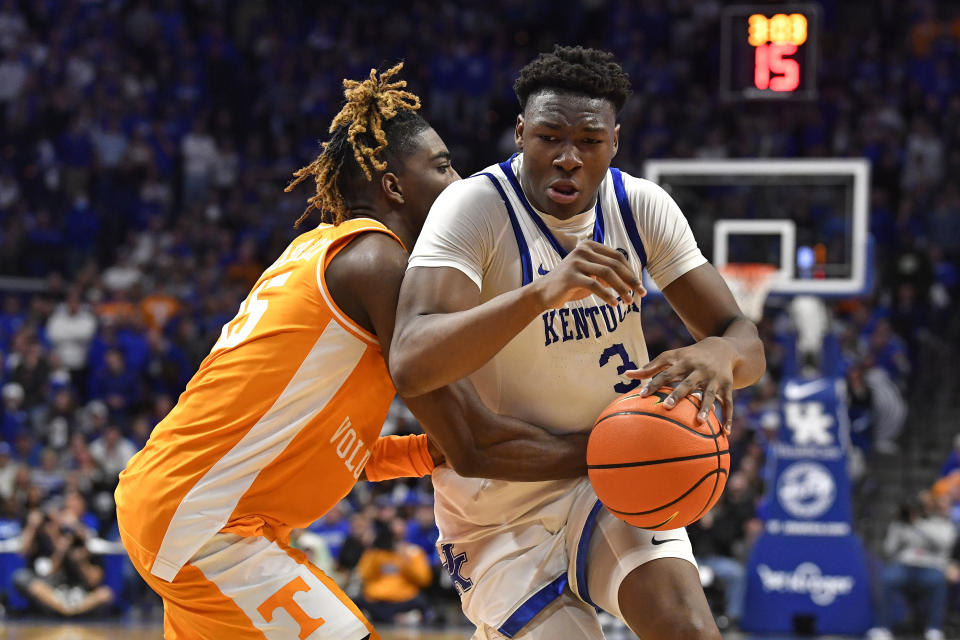 Kentucky guard Adou Thiero (3) tries to get through the defense of Tennessee guard Jahmai Mashack (15) during the second half of an NCAA college basketball game in Lexington, Ky., Saturday, Feb. 3, 2024. Tennessee won 103-92. (AP Photo/Timothy D. Easley)