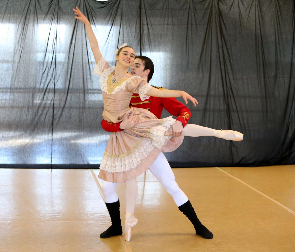 Caitlyn Gongwer, 15, an understudy for the part of Marie, and Fred Stuckwisch, 17, as The Nutcracker, rehearse the snow scene in the Southold Dance Company's production of "The Nutcracker" on Nov. 21, 2022, at the Colfax Cultural Center in South Bend.