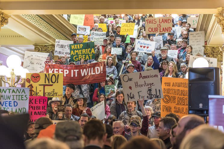 Members of conservation groups gathered on Jan. 30 in Helena, Mont., to protest a plan to transfer public lands to the states or sell them off to private individuals or companies. (Photo: William Campbell/Corbis via Getty Images)