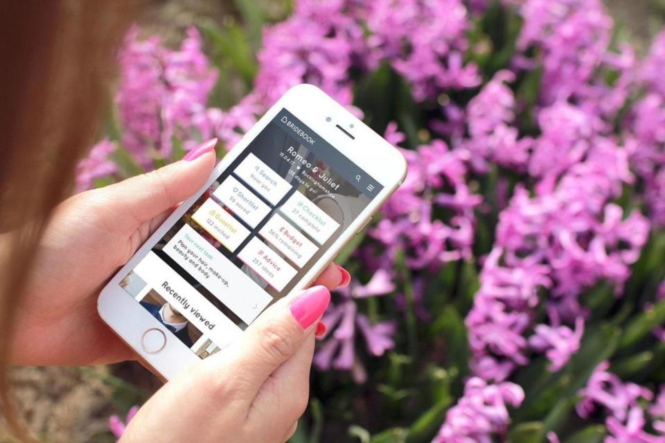 This free wedding planning website recently released a free app for iPhone users. (Chloe Nalbantian)