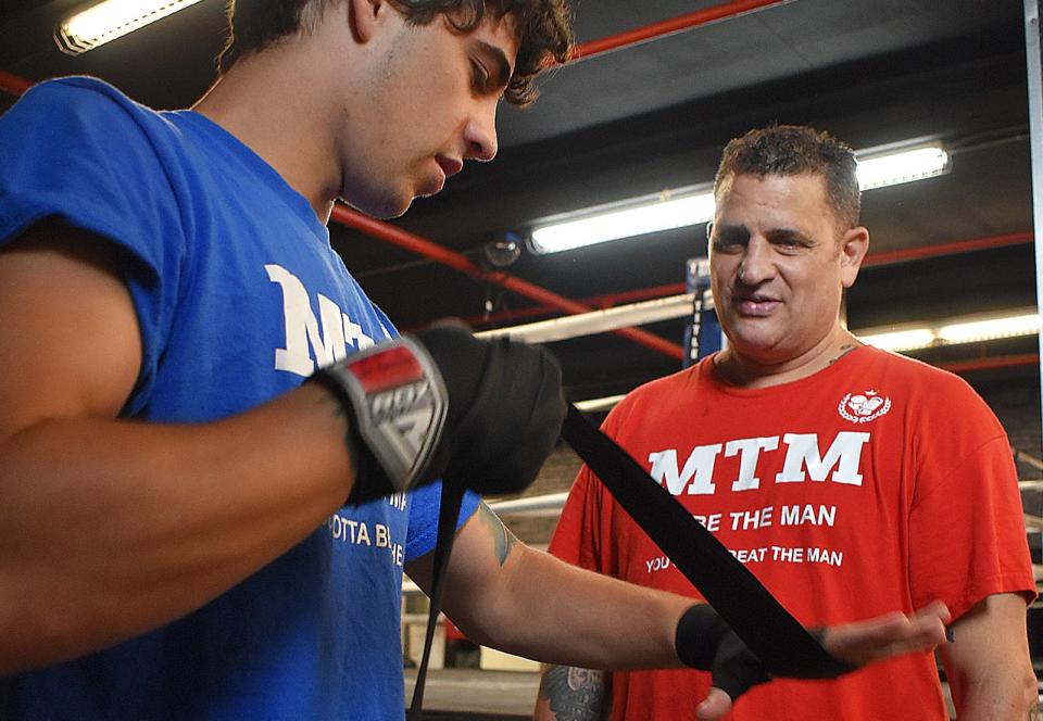 Boxer Michael Gaudreau trains with his dad Michael Gaudreau.