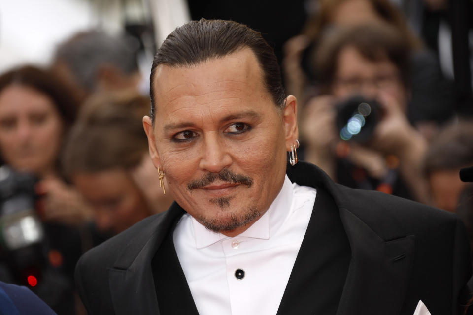Johnny Depp poses for photographers upon arrival at the opening ceremony and the premiere of the film 'Jeanne du Barry' at the 76th international film festival, Cannes, southern France, Tuesday, May 16, 2023. (Photo by Joel C Ryan/Invision/AP)