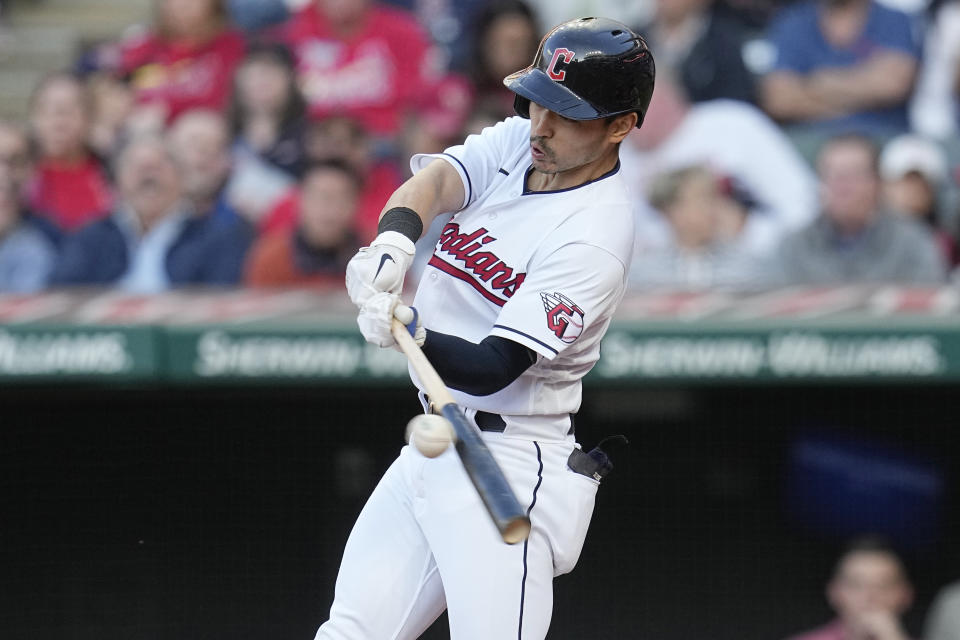 Cleveland Guardians' Steven Kwan hits a single against the St. Louis Cardinals during the third inning of a baseball game Friday, May 26, 2023, in Cleveland. (AP Photo/Sue Ogrocki)