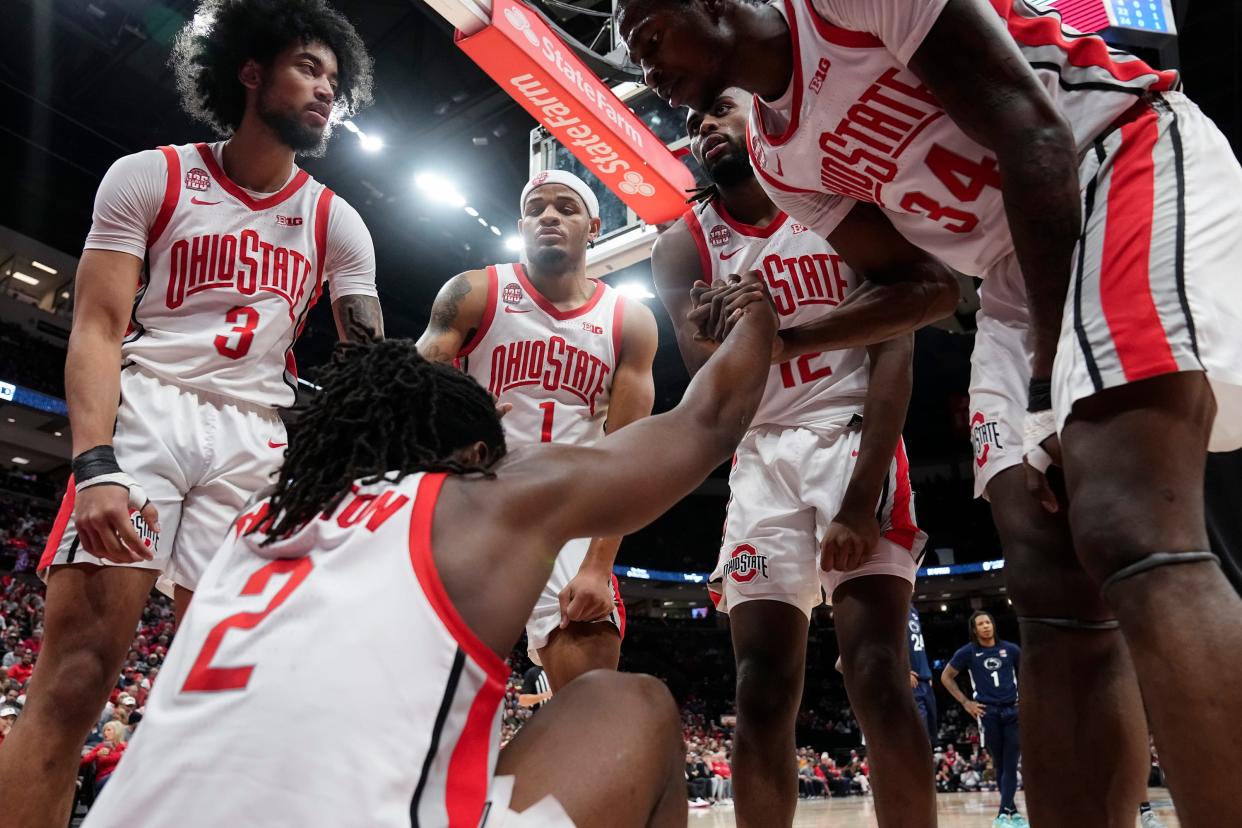 Jan 20, 2024; Columbus, Ohio, USA; Teammates help up Ohio State Buckeyes guard Bruce Thornton (2) after he got hit in the eye during the NCAA men’s basketball game against the Penn State Nittany Lions at Value City Arena.