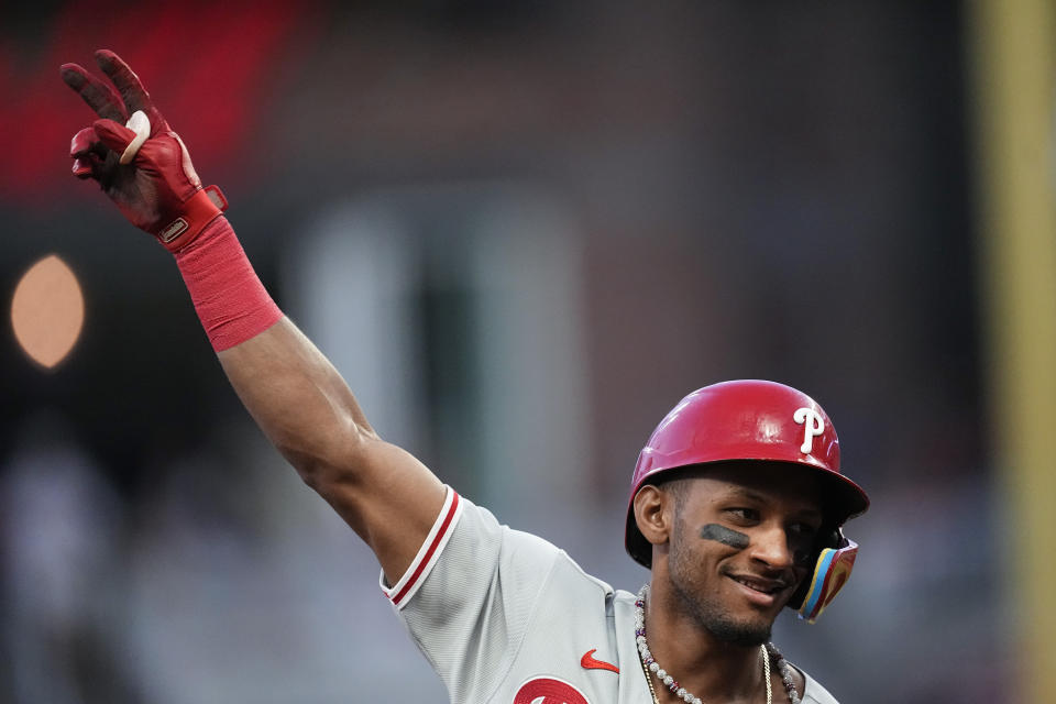 Philadelphia Phillies' Johan Rojas gestures as he ronnds the bases after hitting a two-run home run in the second inning of a baseball game against the Atlanta Braves Monday, Sept. 18, 2023. (AP Photo/John Bazemore)