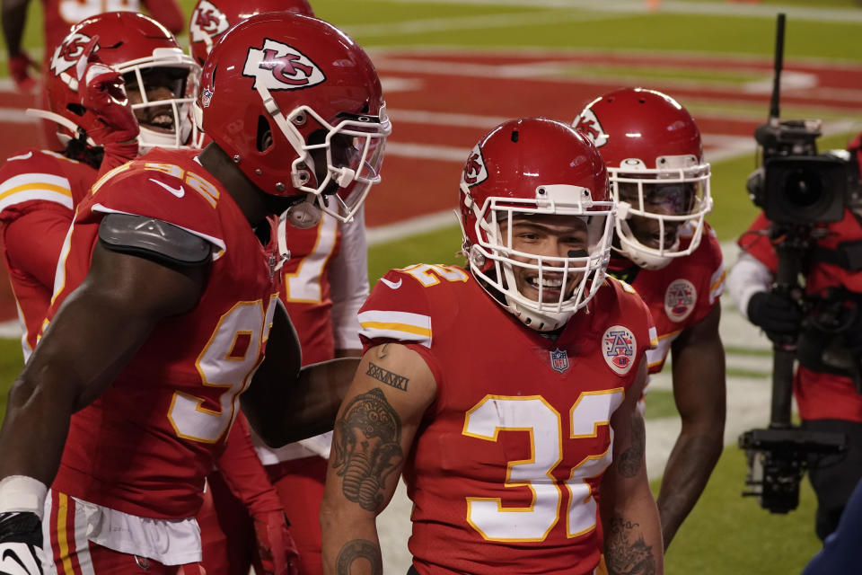 Kansas City Chiefs strong safety Tyrann Mathieu (32) reacts after his interception against the Denver Broncos in the first half of an NFL football game in Kansas City, Mo., Sunday, Dec. 6, 2020. (AP Photo/Charlie Riedel)