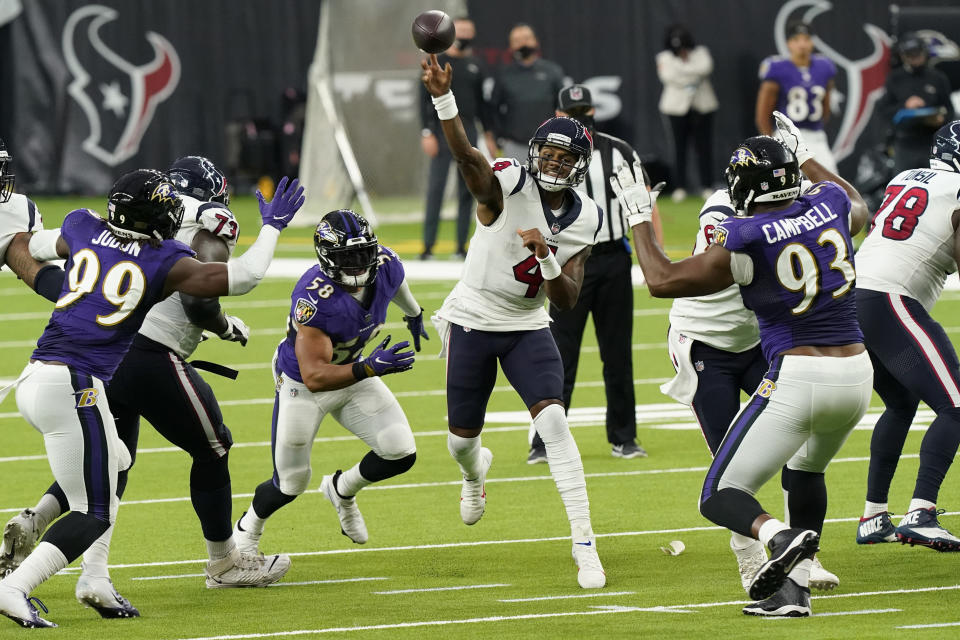 Houston Texans quarterback Deshaun Watson (4) throws against the Baltimore Ravens during the second half of an NFL football game Sunday, Sept. 20, 2020, in Houston. (AP Photo/David J. Phillip)