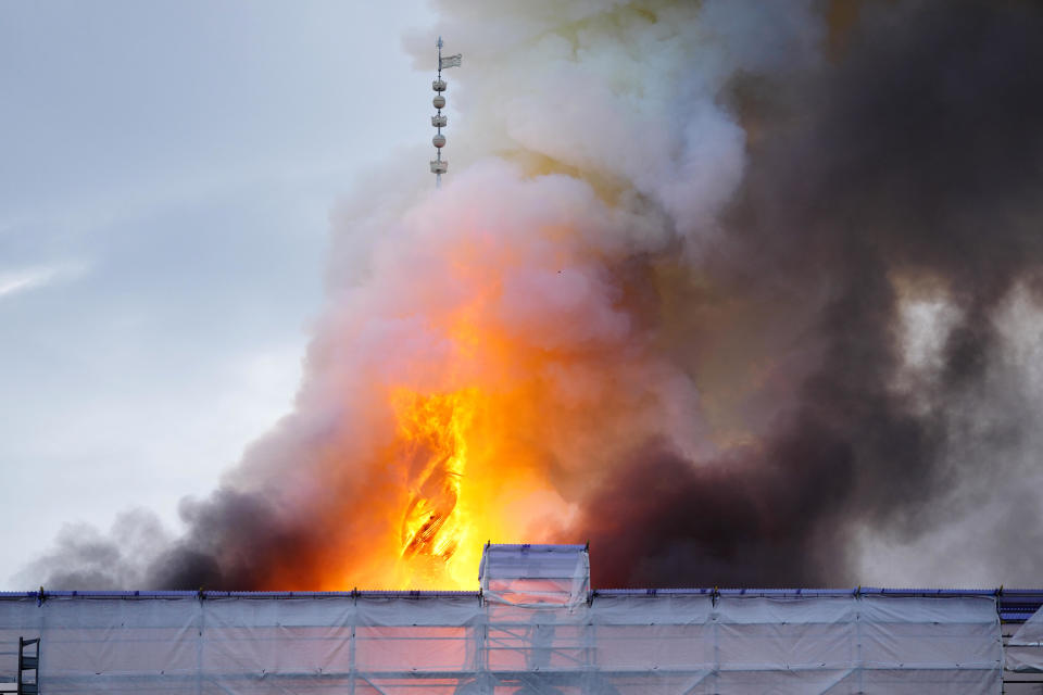 This photograph shows flames engulfing the Copenhagen's Stock Exchange building, in Copenhagen, on April 16, 2024. / Credit: IDA MARIE ODGAARD/Ritzau Scanpix/AFP via Getty Images