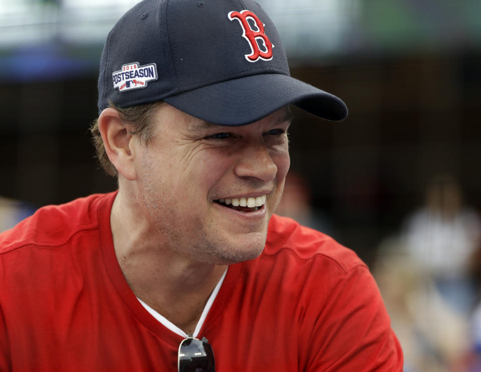 FILE - In this Sunday, Oct. 28, 2018 file photo, Actor Matt Damon waits for Game 5 of the World Series baseball game in Los Angeles. Damon has on Wednesday, May 13, 2020 described living in Ireland during the country’s coronavirus lockdown as like being in a “fairy tale” during a surprise radio interview. The Hollywood star and his family were in Dublin, where he had been filming Ridley Scott’s “The Last Duel,” before travel restrictions were imposed worldwide. (AP Photo/David J. Phillip, file)