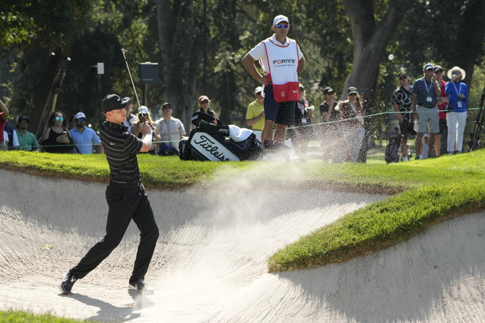 Cam Davis, of Australia, hits out of a bunker up to the sixth green of the Silverado Resort North Course during the final round of the Fortinet Championship PGA golf tournament in Napa, Calif., Sunday, Sept. 17, 2023. (AP Photo/Eric Risberg)