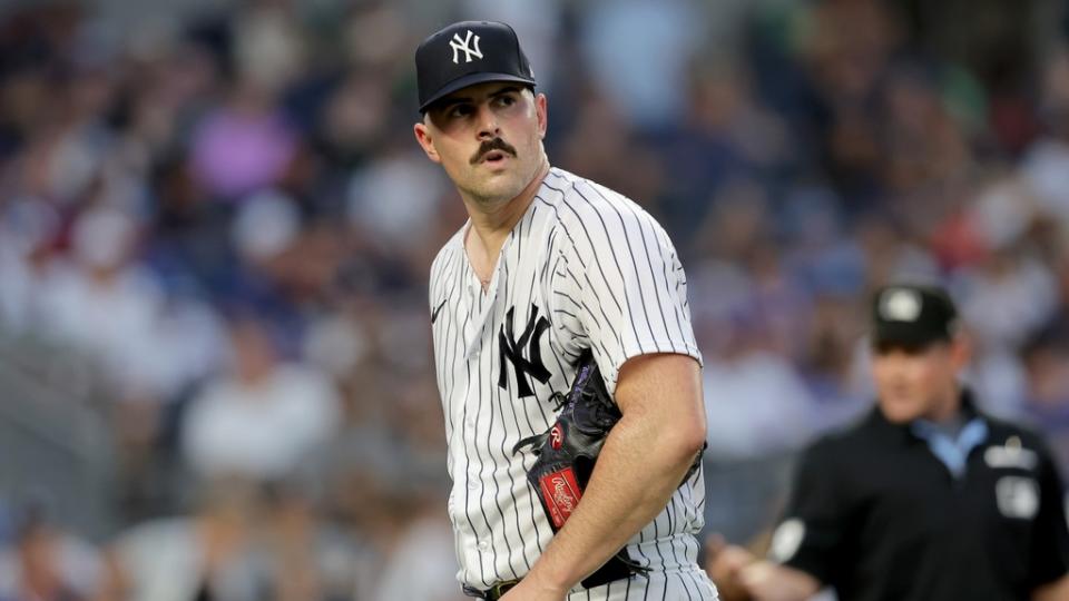 Jul 7, 2023; Bronx, New York, USA; New York Yankees starting pitcher Carlos Rodon (55) reacts during the fifth inning against the Chicago Cubs at Yankee Stadium.