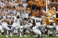Texas A&M place kicker Randy Bond (47) attempts a field goal as punter Nik Constantinou (95) holds during the second half of an NCAA college football game against Tennessee, Saturday, Oct. 14, 2023, in Knoxville, Tenn. (AP Photo/Wade Payne)