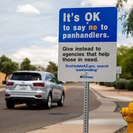 Scottsdale is placing temporary signs throughout the city to discourage residents from donating to panhandlers and instead donate to social service agencies.