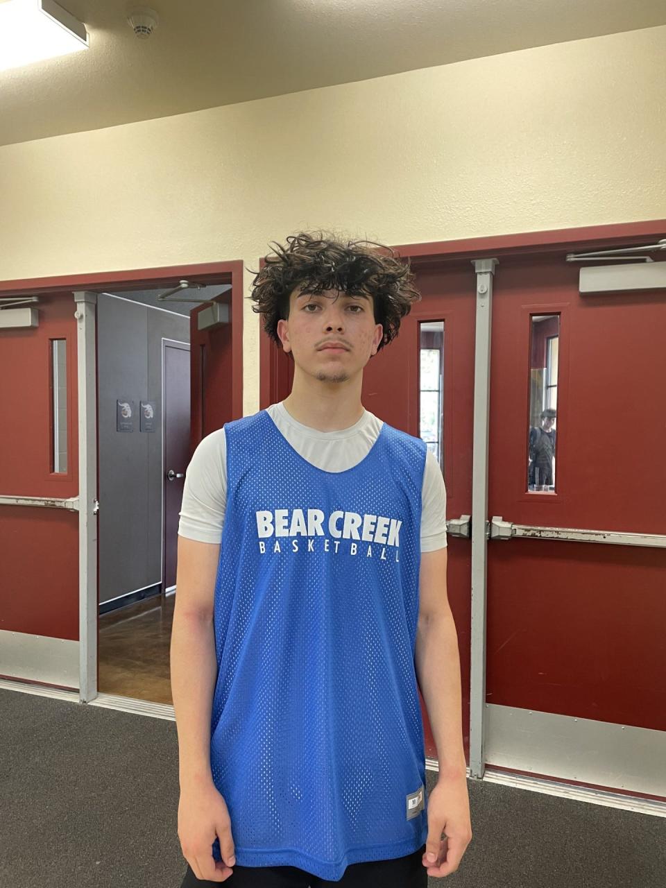 Adam Perez of Bear Creek basketball pose for a photo after a game at Edison High School for the Modesto Christian Summer Classic.