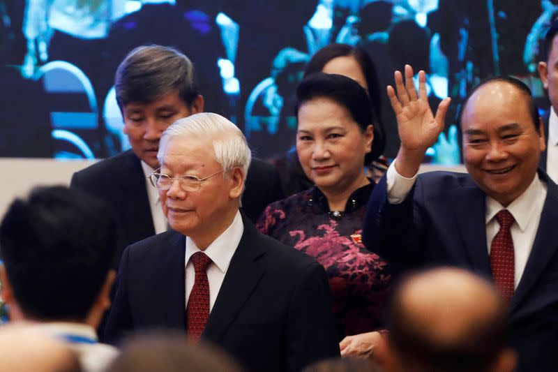 FILE PHOTO: Vietnamese leaders arrive at an ASEAN summit in Hanoi