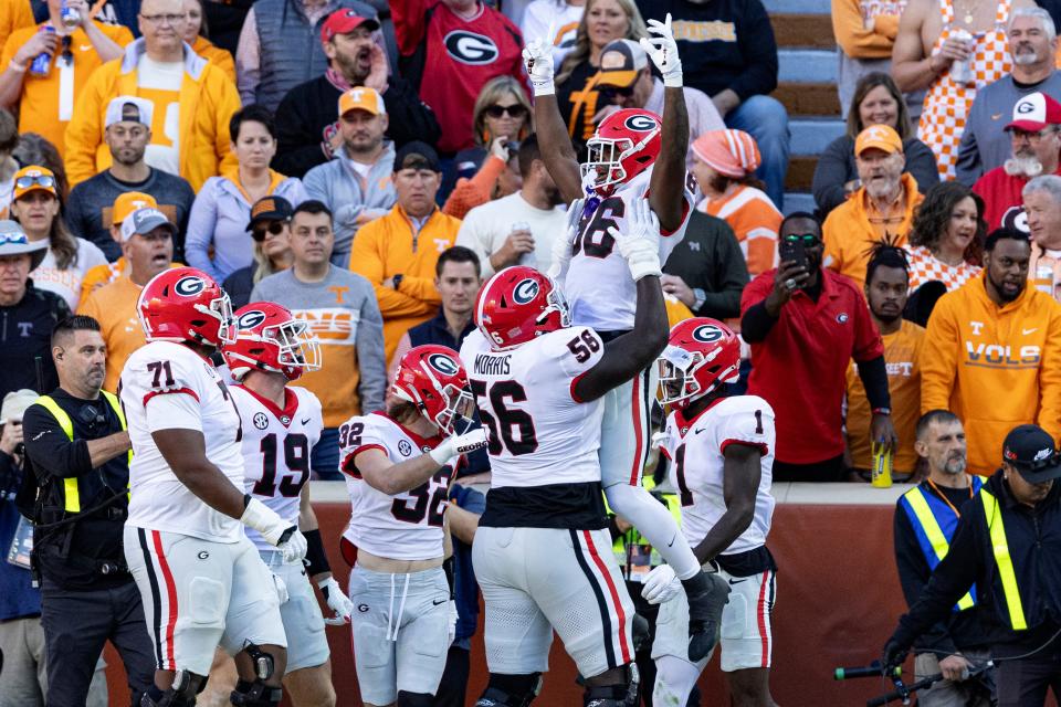 Georgia wide receiver Dillon Bell (86) celebrates a touchdown during the first half against Tennessee at Neyland Stadium, Saturday, Nov. 18, 2023, in Knoxville, Tenn.