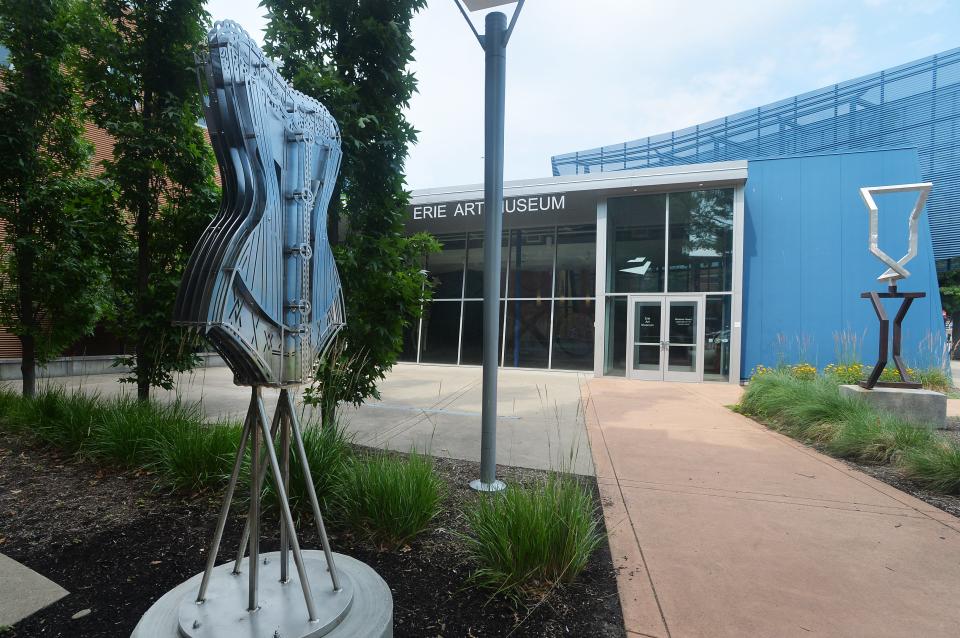 The sculpture “Flat Curves II,” left, by artist Jennifer Rubin-Garey, is shown July 14 near the Erie Art Museum entrance, 20 E. Fifth St. The piece is part of the Erie Arts & Culture Sculpture Walk.
