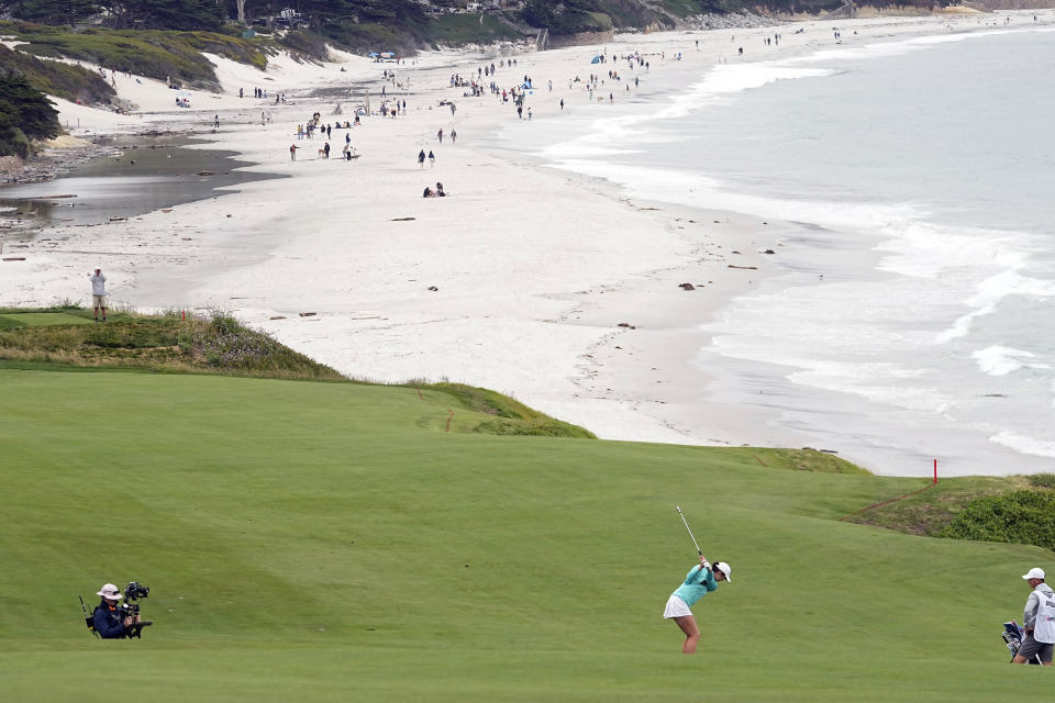 Aine Donegan, of Ireland, hits from the fairway on the ninth hole during the first round of the U.S. Women's Open golf tournament at the Pebble Beach Golf Links, Thursday, July 6, 2023, in Pebble Beach, Calif. (AP Photo/Darron Cummings)