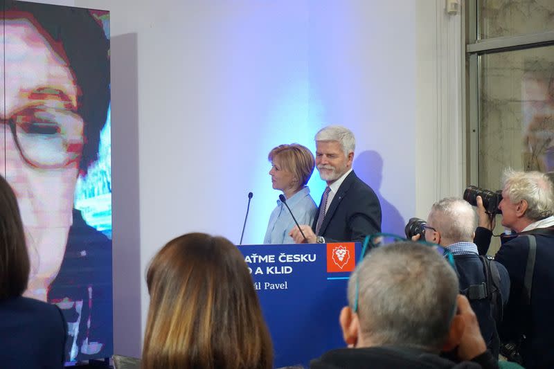 Czech presidential candidate Pavel reacts on the day of the first round of the election, in Prague