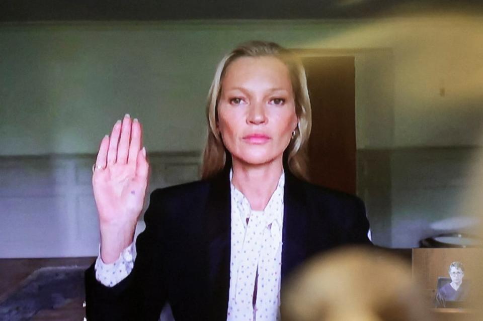 Kate Moss is sworn in to testify via video link during her ex-boyfriend Johnny Depp's defamation trial (REUTERS)