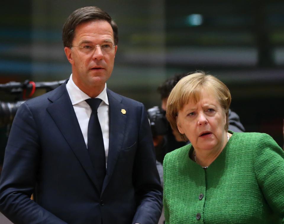 Dutch PM Mark Rutte and German Chancellor Angela Merkel (Getty)