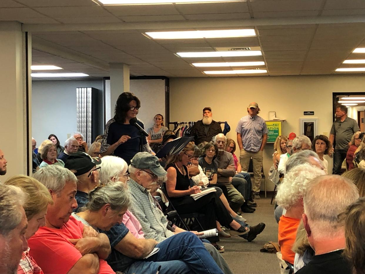 Granville Mayor Melissa Hartfield, center, speaks about the negative impact two proposed asphalt plants in Alexandria could have on Granville, Alexandria and St. Albans Township during a public hearing on June 8.