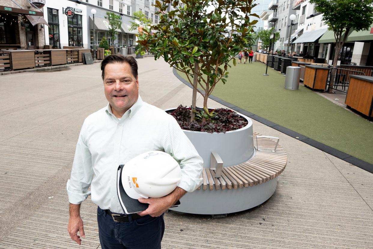 Phil Beck, Development at the Banks manager, stand at the Banks in Cincinnati