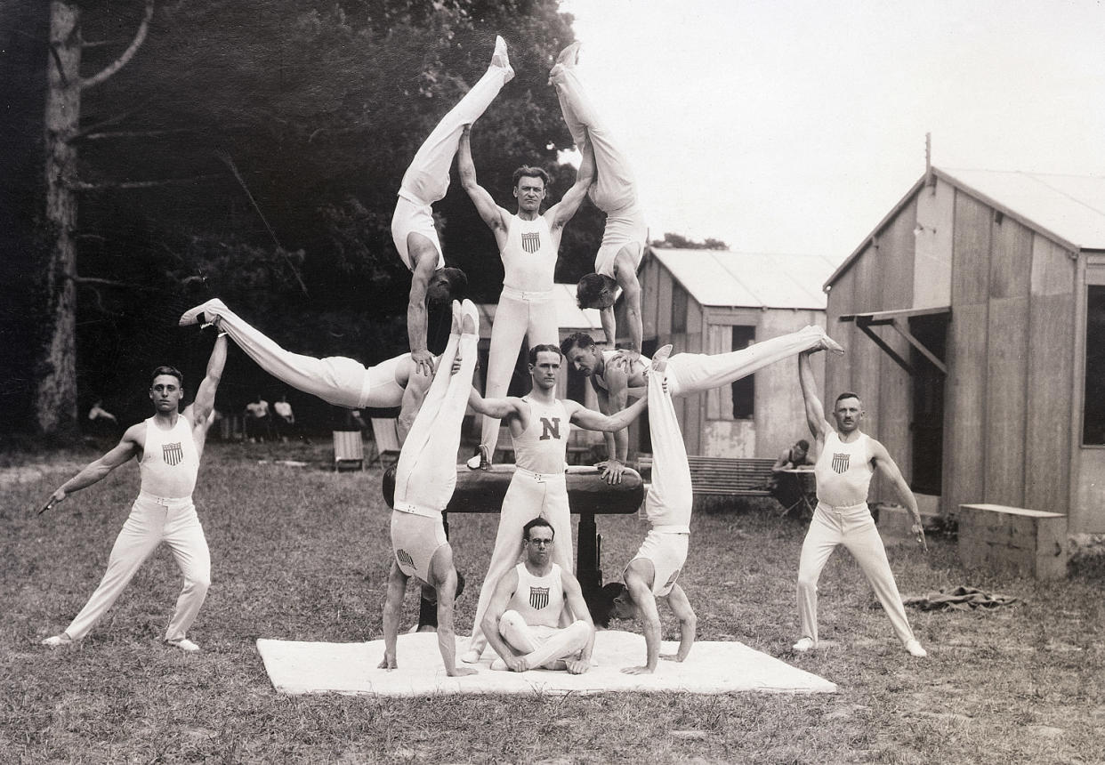 US Olympic Gymnasts Pose in Pyramid (Bettmann Archive)