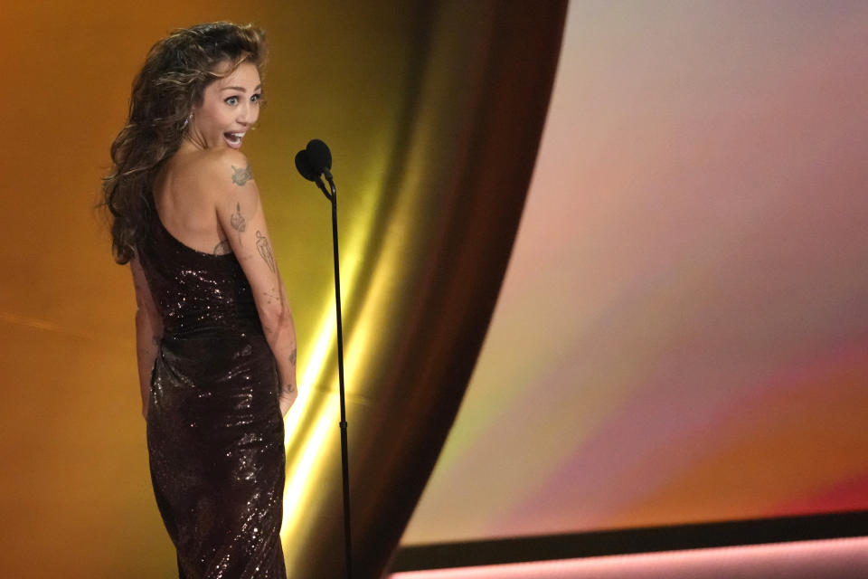 Miley Cyrus accepts the award for record of the year for "Flowers" during the 66th annual Grammy Awards on Sunday, Feb. 4, 2024, in Los Angeles. (AP Photo/Chris Pizzello)
