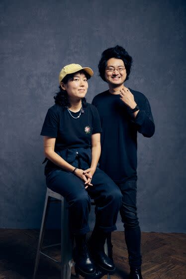 Actress Park Ji-Min, left and writer and director Davy Chou, with the film, "Return To Seoul,"