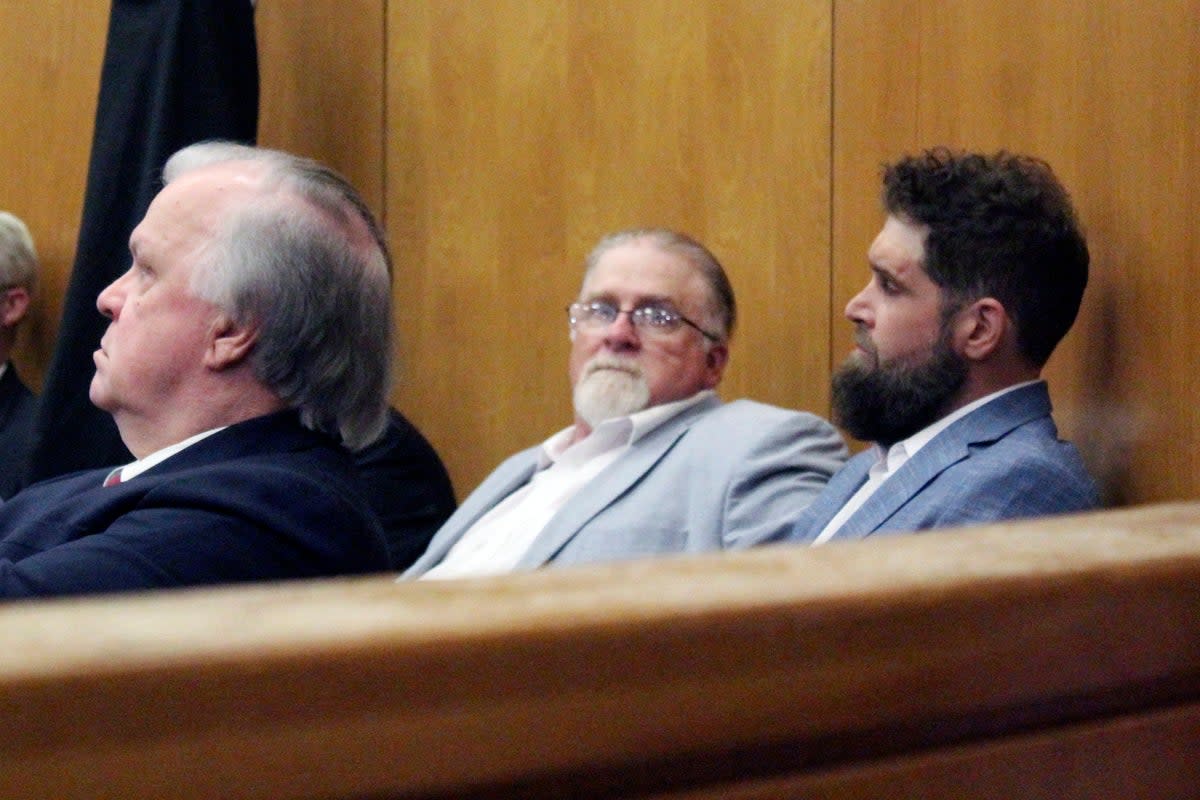 Gregory Case and Brandon Case (pictured second from right and right) at their trial earlier this month (AP)