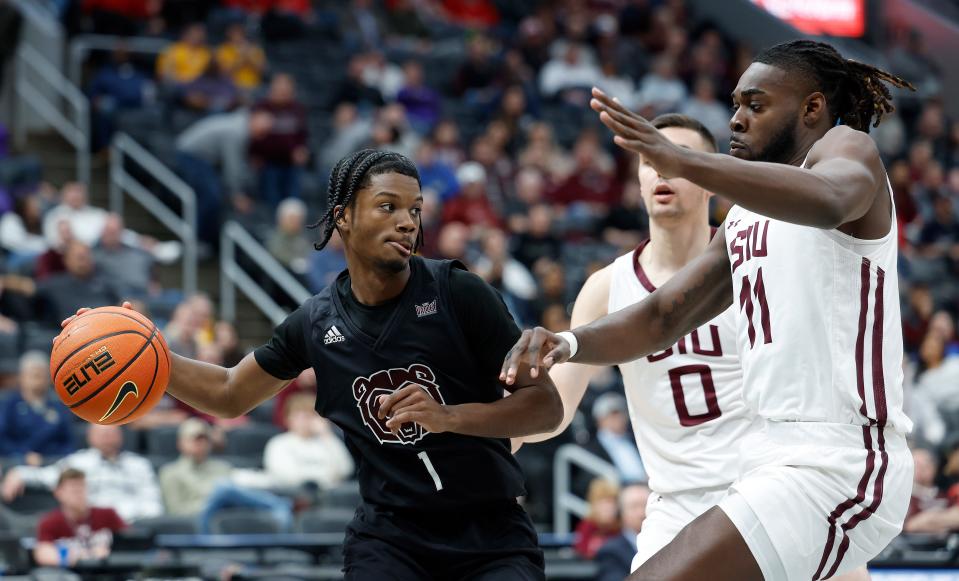 Missouri State's Alston Mason (1) looks to move the ball during a Missouri Valley Conference Tournament game against Southern Illinois, Friday, March 3, 2023, at Enterprise Center in St. Louis. 