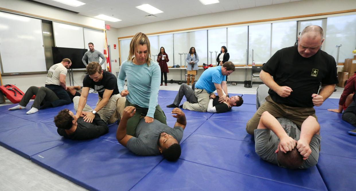 The Tuscaloosa Police Department showed off some of the features of the renovated police headquarters building Friday, Nov. 5, 2021. Recruit officers go through hand-to-hand combat training with instructors in a new gymnasium-styled area that also features a weight room. [Staff Photo/Gary Cosby Jr.]