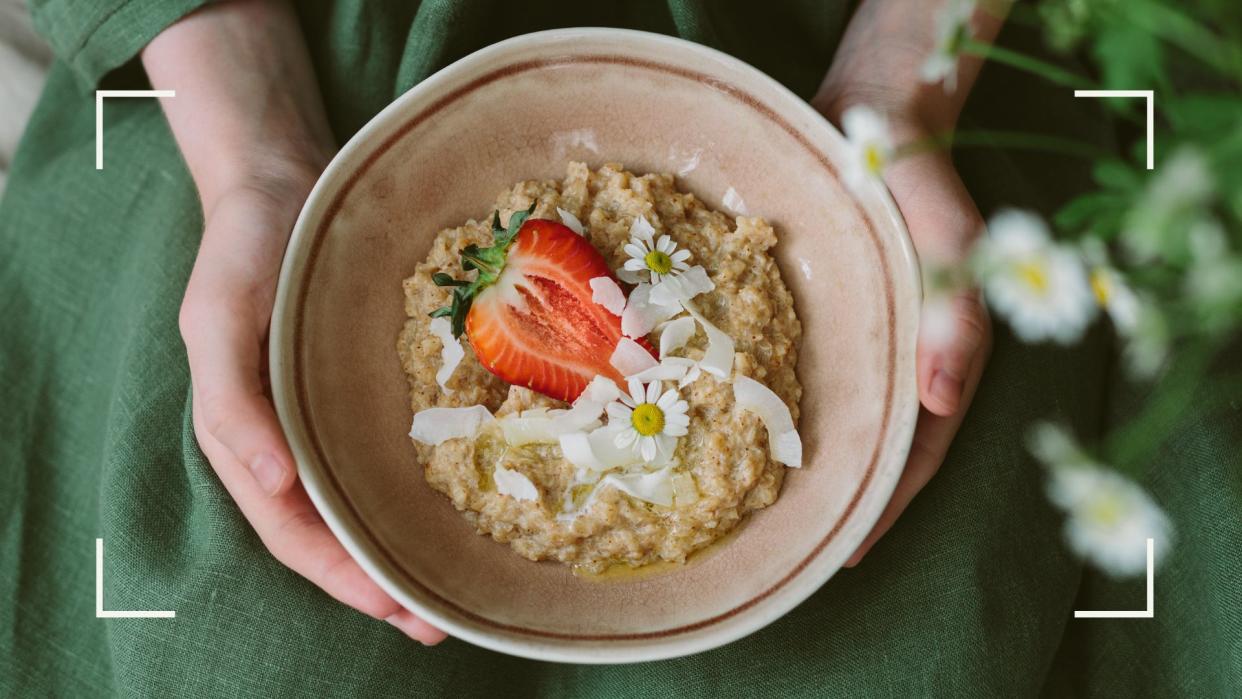  Doctor reveals why you should eat porridge - woman holding bowl of porridge with toppings. 